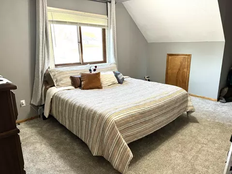 Bedroom - 209 S 7th St, Olivia, MN 56277 photo 2 of 6
