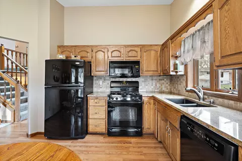 Kitchen - 10959 Xylon Ct, Champlin, MN 55316 photo 2 of 2