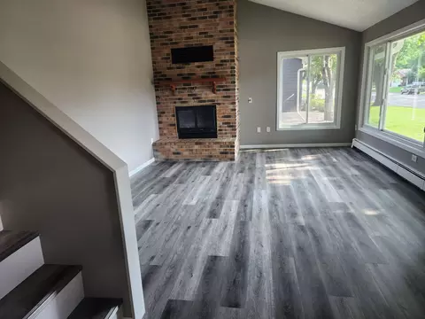 Living - 409 S 2nd St, Olivia, MN 56277 photo 1 of 3