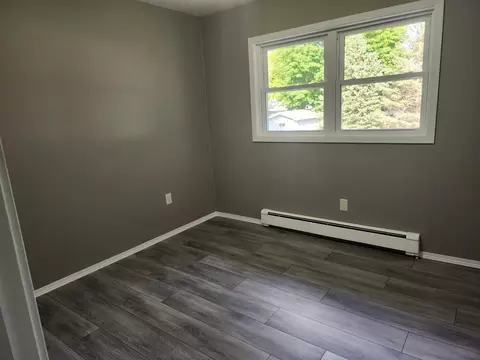 Bedroom - 409 S 2nd St, Olivia, MN 56277 photo 3 of 4