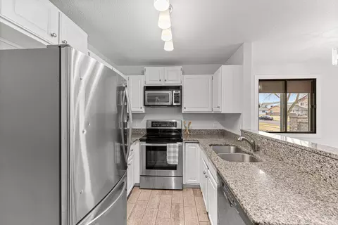 Kitchen - 8428 S Pond Trl #41, Champlin, MN 55316 photo 2 of 2