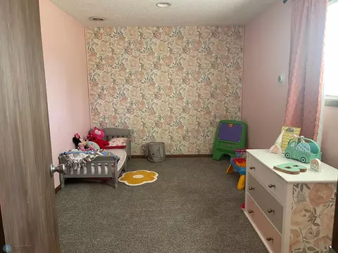 Bedroom - 404 10th Ave E, Lisbon, ND 58054 photo 2 of 5