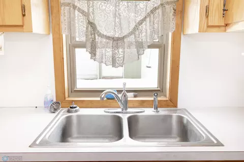 Kitchen - 615 E Adams Ave, Mahnomen, MN 56557 photo 3 of 4