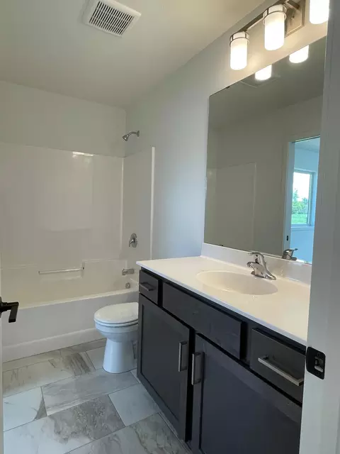 Bath - 921 3rd St #E, Wanamingo, MN 55983 photo 1 of 1