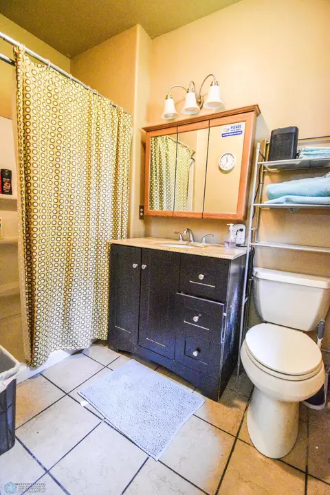 Bath - 505 3rd St, Arthur, ND 58006 photo 1 of 2