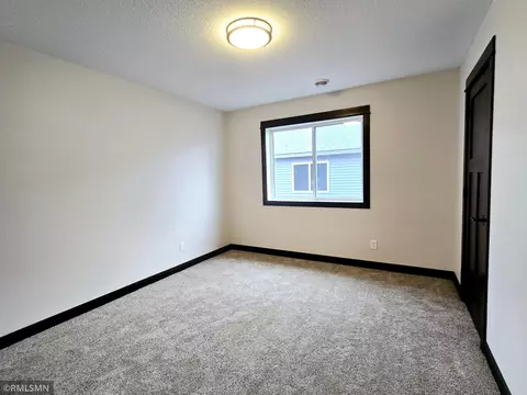 Bedroom - 2001 Essler Dr, Saint Peter, MN 56082 photo 2 of 3