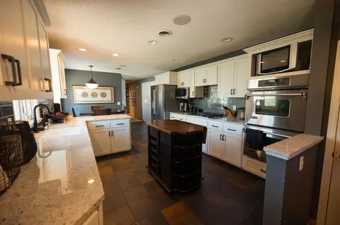 Kitchen - 701 E Oak Ave, Olivia, MN 56277 photo 1 of 4