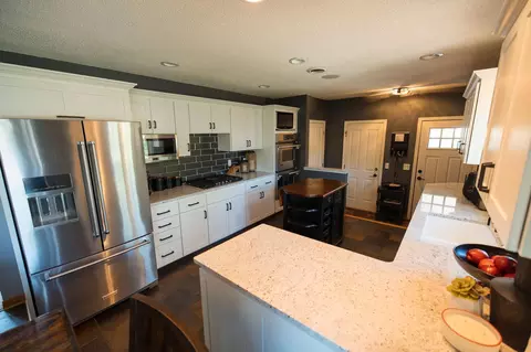 Kitchen - 701 E Oak Ave, Olivia, MN 56277 photo 3 of 4