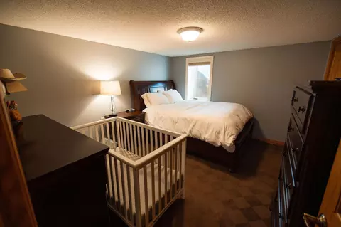 Bedroom - 701 E Oak Ave, Olivia, MN 56277 photo 7 of 8