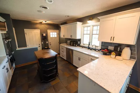 Kitchen - 701 E Oak Ave, Olivia, MN 56277 photo 2 of 4