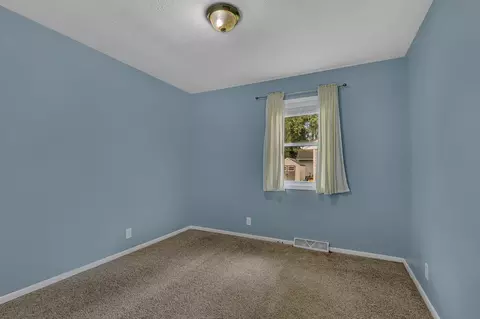 Bedroom - 722 E 4th St, Litchfield, MN 55355 photo 2 of 4