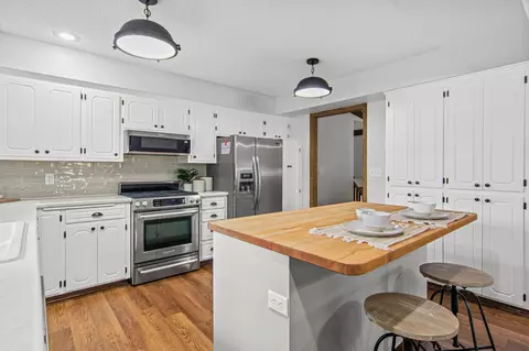 Kitchen - 7401 River Shore Ln, Champlin, MN 55316 photo 4 of 5