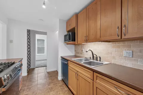 Kitchen - 7221 E River Rd, Fridley, MN 55432 photo 2 of 2