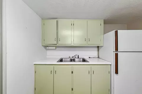 Kitchen - 310 3rd Ave SW, Faribault, MN 55021 photo 7 of 8