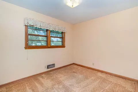 Bedroom - 712 Keniston St N, Champlin, MN 55316 photo 3 of 8