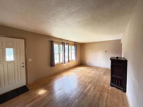 Living - 8369 E River Rd NW, Coon Rapids, MN 55433 photo 1 of 3
