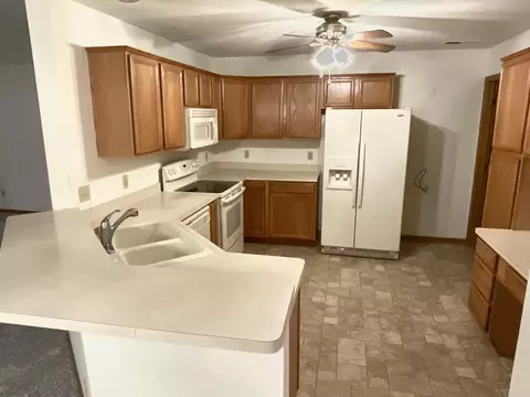 Kitchen - 2102 Oak Tree Ln # C, Austin, MN 55912 photo 1 of 4