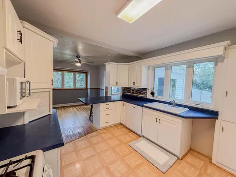 Kitchen - 708 Elm Ave, Olivia, MN 56277 photo 2 of 6