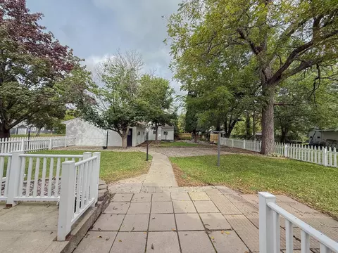 Exterior - 708 Elm Ave, Olivia, MN 56277 photo 11 of 19