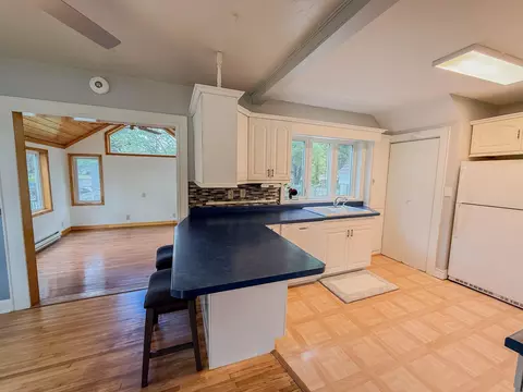 Kitchen - 708 Elm Ave, Olivia, MN 56277 photo 1 of 6