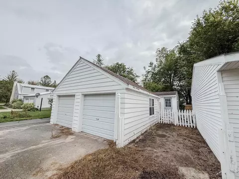 Exterior - 708 Elm Ave, Olivia, MN 56277 photo 5 of 19