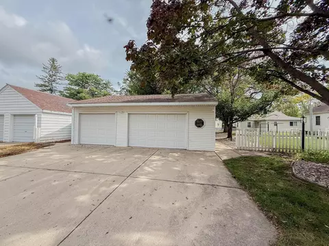 Exterior - 708 Elm Ave, Olivia, MN 56277 photo 4 of 19