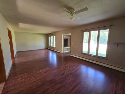 Living - 801 Elm Ave, Olivia, MN 56277 photo 1 of 2