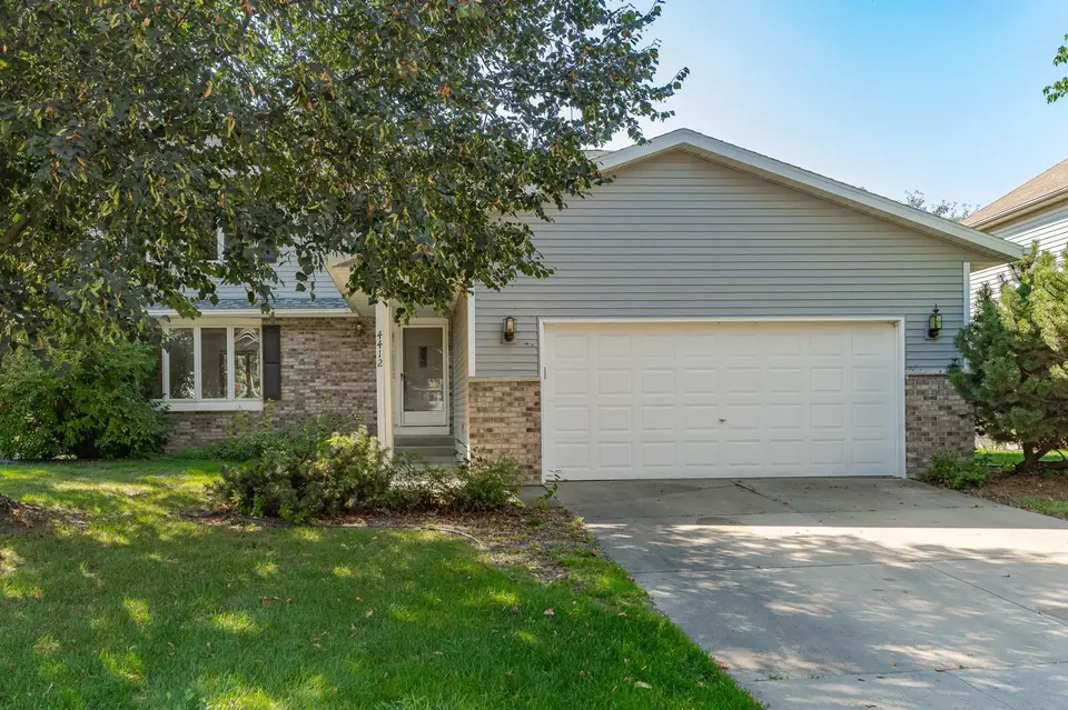Exterior - 4412 Newcastle Ln NW, Rochester, MN 55901 photo 5 of 8
