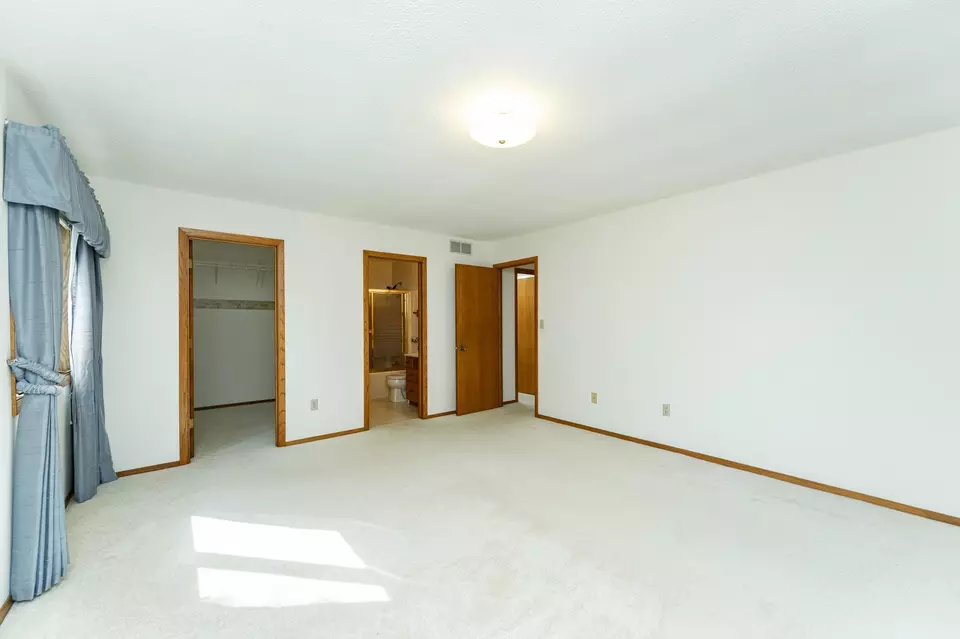 Bedroom - 4412 Newcastle Ln NW, Rochester, MN 55901 photo 2 of 5