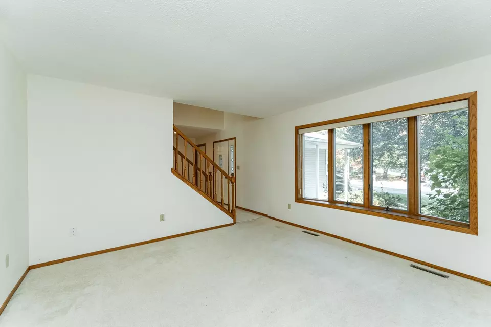 Living - 4412 Newcastle Ln NW, Rochester, MN 55901 photo 2 of 6