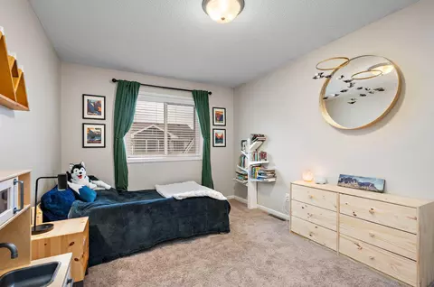 Bedroom - 815 Ludwig Ave N, Champlin, MN 55316 photo 3 of 4