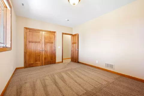 Bedroom - 1502 Epperstone Enclave, Byron, MN 55920 photo 7 of 7
