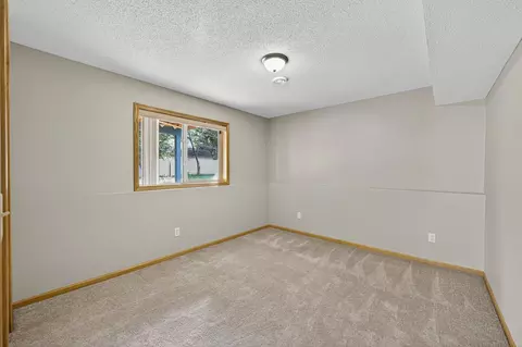Bedroom - 5111 109th Ave N, Champlin, MN 55316 photo 9 of 10