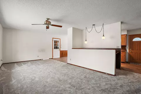 Living - 10933 Gettysburg Ave N, Champlin, MN 55316 photo 2 of 5