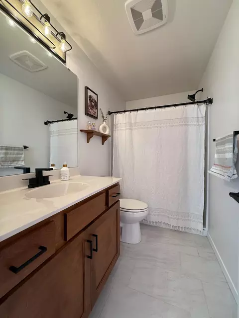 Bath - 888 7th Ave, Wanamingo, MN 55983 photo 1 of 3