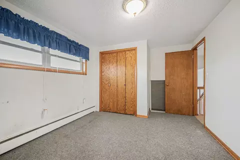 Bedroom - 401 2nd St E, Wanamingo, MN 55983 photo 3 of 6