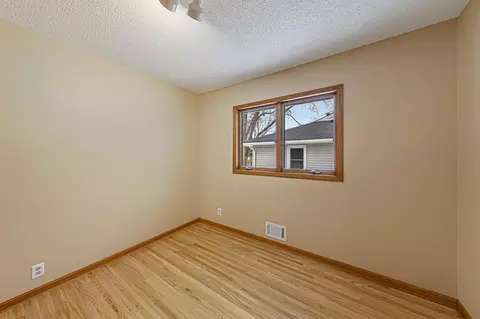 Bedroom - 832 Home Pl, Faribault, MN 55021 photo 3 of 9