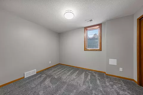 Bedroom - 22 Mitchell Dr, Faribault, MN 55021 photo 9 of 10