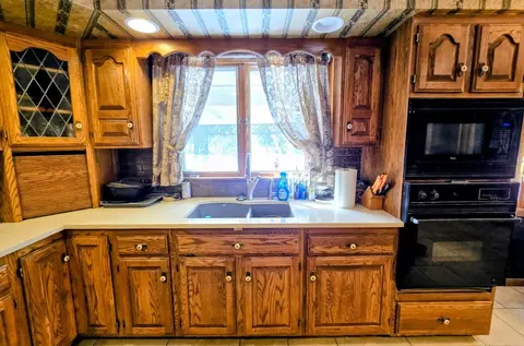 Kitchen - 910 3rd Ave SW, Pipestone, MN 56164 photo 2 of 8