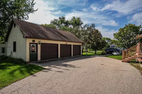 Exterior - 301 E Depue Ave, Olivia, MN 56277 photo 10 of 11