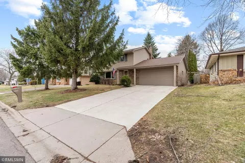 Exterior - 2245 Maple Ln E, Maplewood, MN 55109 photo 2 of 10