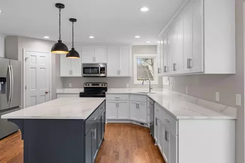 Kitchen - 407 Orleans Ct N, Champlin, MN 55316 photo 2 of 5