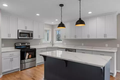 Kitchen - 407 Orleans Ct N, Champlin, MN 55316 photo 3 of 5