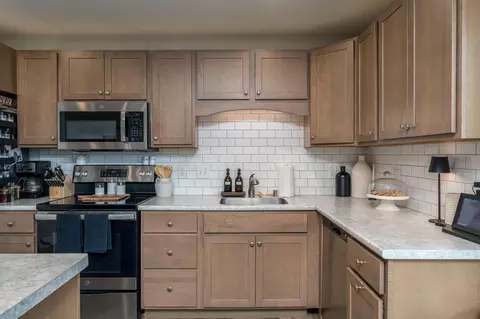 Kitchen - 220 Maple Ave SW, Elysian, MN 56028 photo 10 of 10