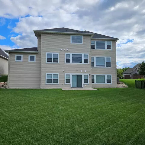 Exterior - 10922 Brookside Trl N, Champlin, MN 55316 photo 4 of 6