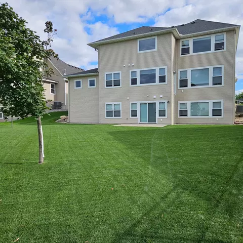 Exterior - 10922 Brookside Trl N, Champlin, MN 55316 photo 5 of 6