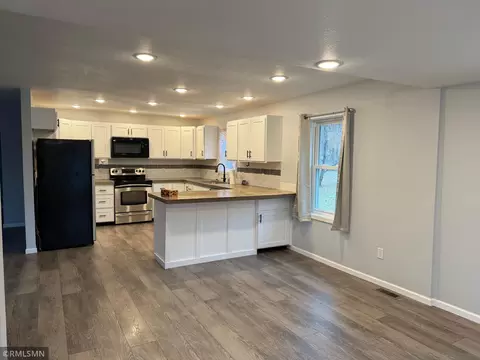 Living - 213 E Park Ave, Luck, WI 54853 photo 2 of 2