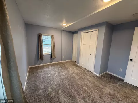 Bedroom - 213 E Park Ave, Luck, WI 54853 photo 2 of 4