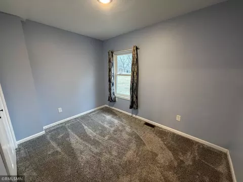 Bedroom - 213 E Park Ave, Luck, WI 54853 photo 3 of 4