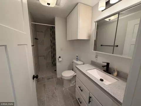 Bath - 213 E Park Ave, Luck, WI 54853 photo 1 of 2